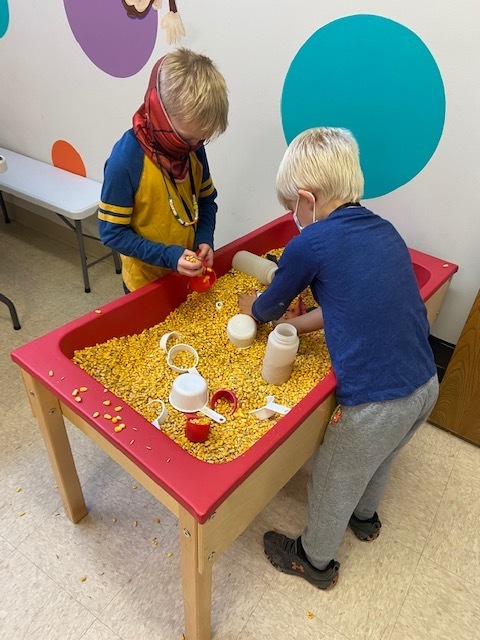 Sensory table with corn