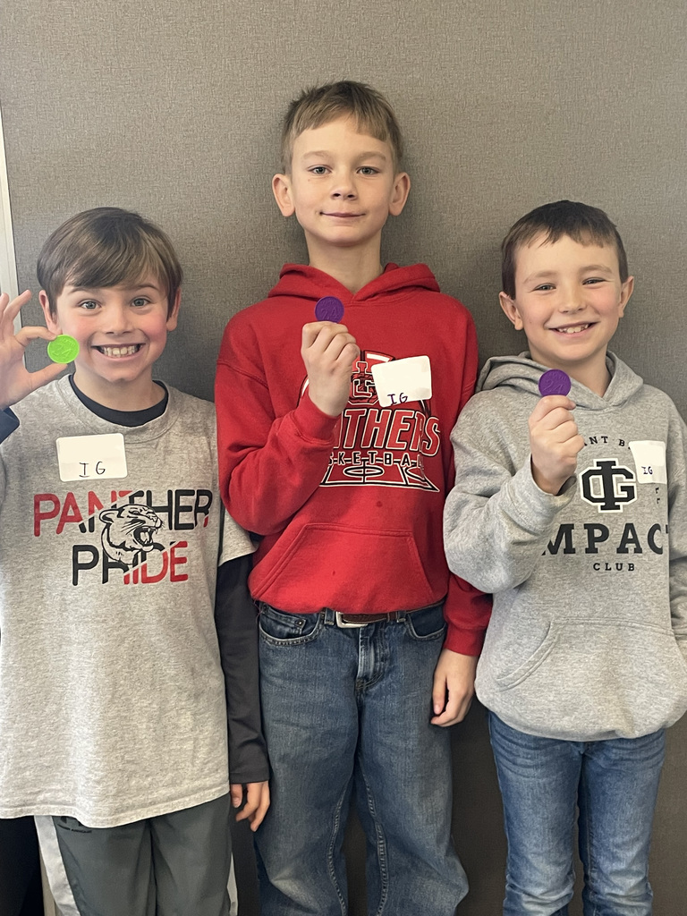 3 students showing their Math 24 medal